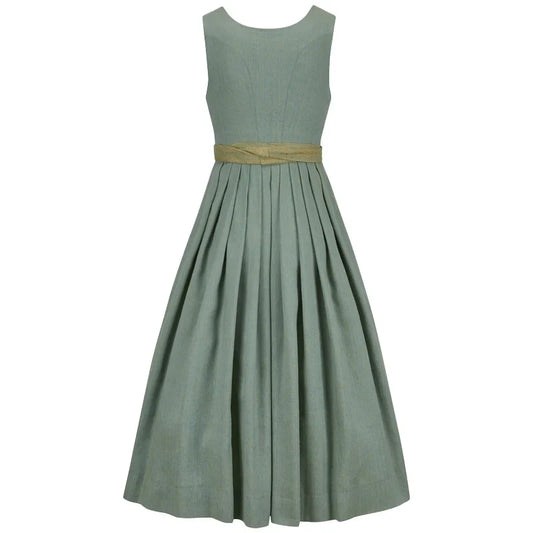 Green dress with a gold belt on a white background